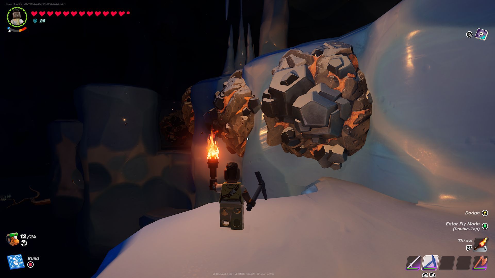 Игрок перед гигантскими глыбами железа вдоль стен ледяной пещеры в Lego Fortnite.